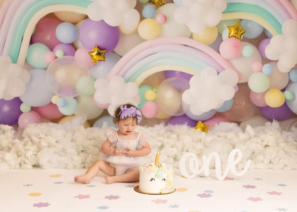 one year old girl at a rainbow unicorn photography session