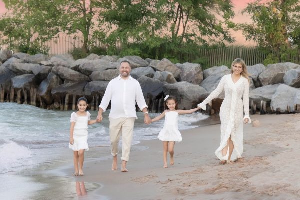 family walking on the beach