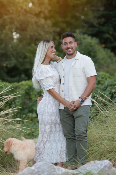 couple smiling during a beach session at Gillson Beach