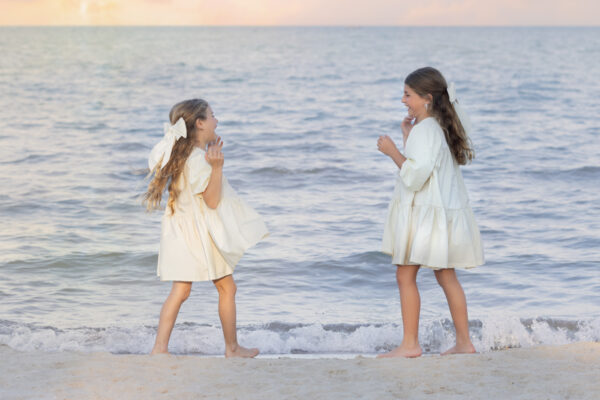 Girls laughing at sunset beach session