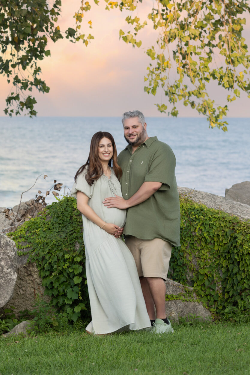 Couple posed at a Lake Michigan Maternity session in Evanston Dawes Park